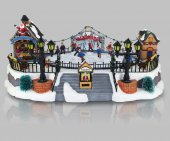 Immagine di 'Villaggio natalizio con pista di pattinaggio, movimento, luci, musica (39 x 18,5 x 28 cm)'