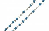 Immagine di 'Rosario perlina azzurra mm.4 con confezione trasparente a forma di caramella'