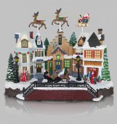 Immagine di 'Villaggio natalizio con Babbo Natale e renne in movimento, luci, musica (39 x 31 x 19 cm)'