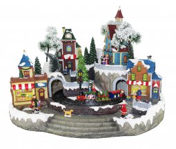 Copertina di 'Villaggio natalizio con treno e negozi, movimento, luci, musica (47 x 34 x 37 cm)'