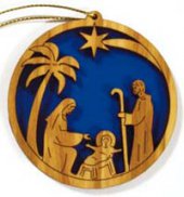 Presepe circolare con Sacra Famiglia, palma e cometa in legno d'ulivo su sfondo blu