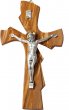 Croce sagomata in legno d'ulivo con Cristo in metallo - altezza 20 cm
