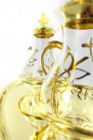 Immagine di 'Ampolline vetro decorate con vassoio dorato con piedini'